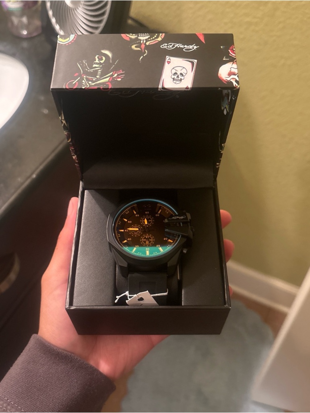 Ed Hardy Black Watch with Teal Accent and Orange Dial Details